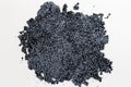 Texture of coal and white granules for water purification. Composition of a home filter for water purification. Minerals