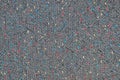 Texture of coarse gray fabric with interspersed multicolor threads Royalty Free Stock Photo