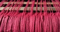 Texture of colorful threads in a handloom