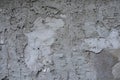 The texture of a concrete wall, unevenly plastered, spots from dampness, roughness and irregularities. Royalty Free Stock Photo