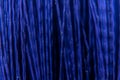A texture consisting of dark blue in plastic twigs