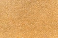 Texture from a corkwood background in brown-yellow color, close up shot.