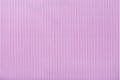 Texture of corrugated light purple paper, macro