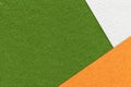 Texture of craft bright green color paper background with white and orange border. Vintage abstract cardboard Royalty Free Stock Photo