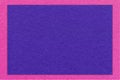 Texture of craft navy blue color paper background with purple border, macro. Vintage dense kraft indigo cardboard Royalty Free Stock Photo