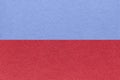 Texture of craft red and blue paper background, half two colors. Structure of vintage very peri and wine cardboard
