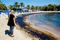 Texture of crude oil spill on sand beach from oil spill accident, Agios Kosmas bay, Athens, Greece, September 14 2017.