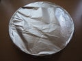 Texture of crumpled aluminum foil for baking. Food foil on a baking sheet before placing in the oven Royalty Free Stock Photo