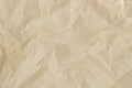 Texture of crumpled beige paper, wrinkled, background Royalty Free Stock Photo