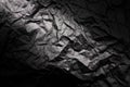 Texture of crumpled black paper with gradient. Dark paper background with wrinkles and folds Royalty Free Stock Photo