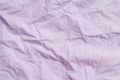 The texture of crumpled fabric is entirely lilac