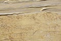 The texture of crumpled paper, and gold paint relief Royalty Free Stock Photo