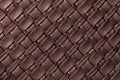 Texture of dark brown leather background with wicker pattern, macro Royalty Free Stock Photo