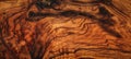 Texture of dark brown olive wood plank. background of wooden surface