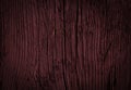 Texture of dark burgundy old rough wood. Mahogany abstract background for design. Royalty Free Stock Photo