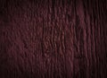 Texture of dark burgundy old rough wood. Mahogany abstract background for design.