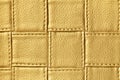 Texture of golden and yellow leather background with square pattern and stitch Royalty Free Stock Photo