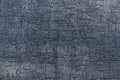 Texture of a dark grey scratched surface, stone decorative plaster or concrete wall Royalty Free Stock Photo