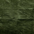 Texture of dark khaki crumpled fabric