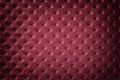 Texture of dark red leather background with capitone pattern with vignette Royalty Free Stock Photo