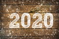 2020. Texture dark wood ilfri 2020.New year background. Retro wooden table Royalty Free Stock Photo