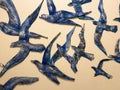 Texture of decorative blue stone birds on the wall. The background Royalty Free Stock Photo