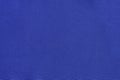 texture of deep blue fabric close-up. background for your design. material for sewing clothes