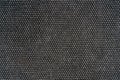 The texture of a dense gray woolen fabric.