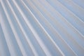 Texture of diagonal stripes with a shadow, with triangular curved ribs, edges of light white fabric, paper with triangular strips Royalty Free Stock Photo
