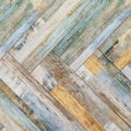 Texture of different motley boards laid diagonally. Background, corner parquet. laminate floor