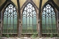 texture of dirty glass in a gothic revival warehouses pointed arch windows