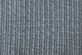 Texture by discoloured gray woven fabric, with lights. Royalty Free Stock Photo