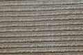 Texture by discoloured gray woven fabric, with lights. Royalty Free Stock Photo