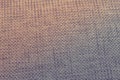 Texture by discoloured gray woven fabric, with lights. Royalty Free Stock Photo