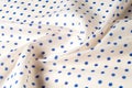 Texture. Drawing. Silk fabric. Polka blue on white background, I