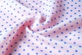 Texture. Drawing. Silk fabric. Polka blue on white background, I