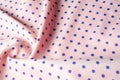 Texture. Drawing. Silk fabric. Polka blue on white background, I