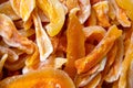 Texture of dried candied melon slices. Top views, close-up