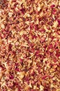 Texture dried rose petals, leaves. Potpourri, desiccated rose buds background. Top view