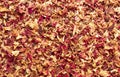 Texture dried rose petals, leaves. Potpourri, desiccated rose buds background. Top view Royalty Free Stock Photo