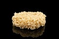 Texture of dry instant noodles isolated on black background. Raw dried Instant ramen noodles block isolated Royalty Free Stock Photo