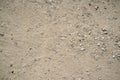 Texture of Dusty and Rocky Road with Car and Bicycle Trails Royalty Free Stock Photo