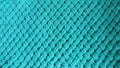 Texture of embossed turquoise handmade plaid closeup background