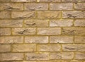 Texture of erose yellow brick wall Royalty Free Stock Photo