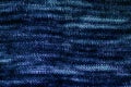 The texture of the fabric is blue. Knitted, cotton, wool background. Royalty Free Stock Photo