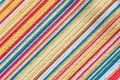 Texture of fabric with colorful diagonal stripes pattern.