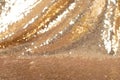 The texture of the fabric embroidered with small golden sequins. Royalty Free Stock Photo