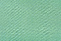 Texture of fabric for furniture upholstery. Wear-resistant fabric for furniture. Texture of green fabric close up top Royalty Free Stock Photo