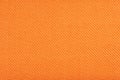 Texture of fabric for furniture upholstery. Wear-resistant fabric for furniture. Texture of orange fabric close up top Royalty Free Stock Photo
