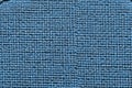The texture of the fabric with a large mesh, dark and light shades of blue and light blue. Royalty Free Stock Photo